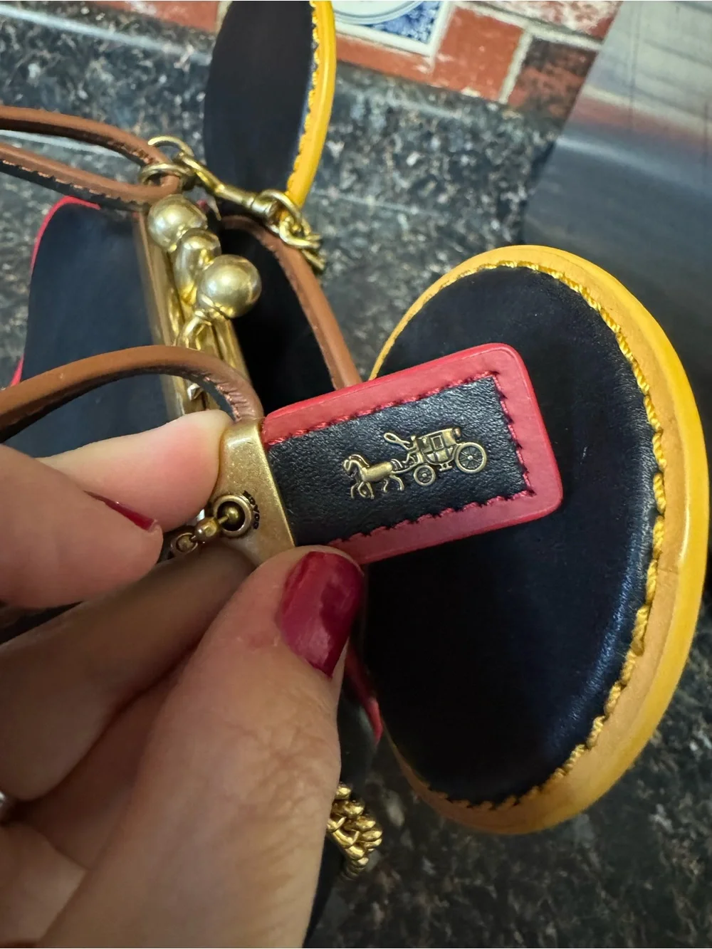 Coach Black Mini Bag with Yellow Ear Trim and Gold Chain
